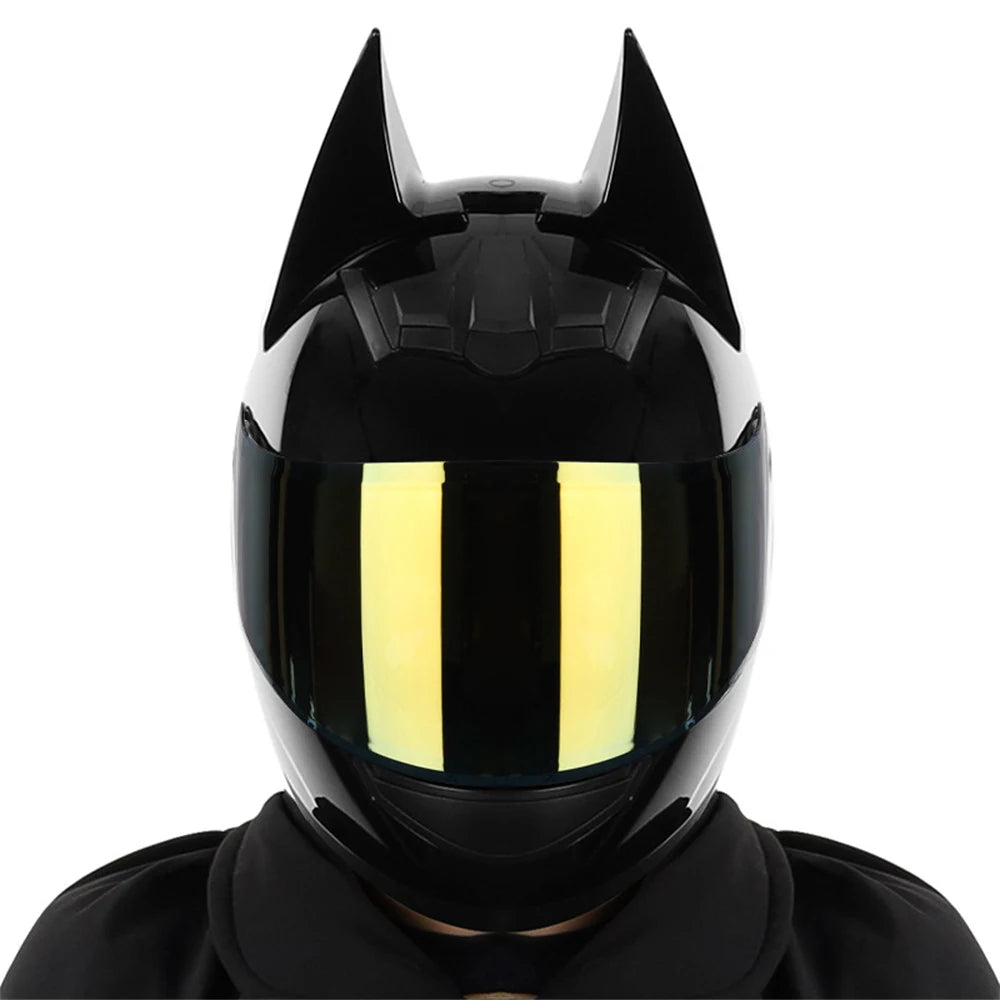 Black full face motorcycle helmet with a yellow visor and detachable horns