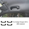 Black carbon fiber trim pieces for Dodge Charger interior door panel.