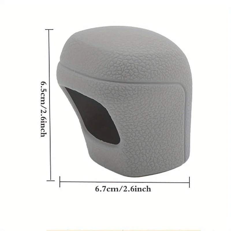 Gray universal car gear shift knob cover with a cutout for visibility