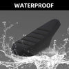 A black motorcycle seat cover is shown being splashed by water, demonstrating its waterproof feature.