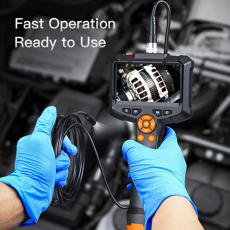 A hand in a blue glove holds an industrial HD inspection camera with a flexible cable, ready for operation.