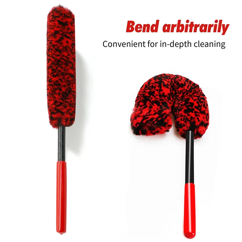A set of three red and black wool cleaning brushes for in-depth detailing