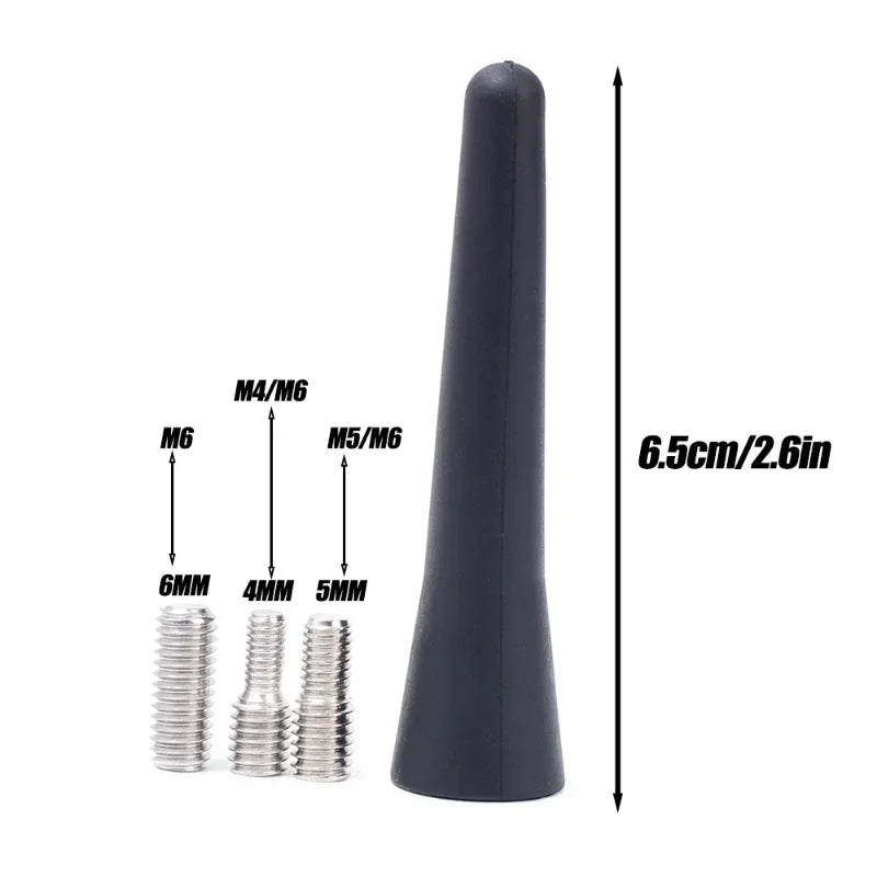 A black universal car roof antenna with a threaded mounting post and a long shaft.