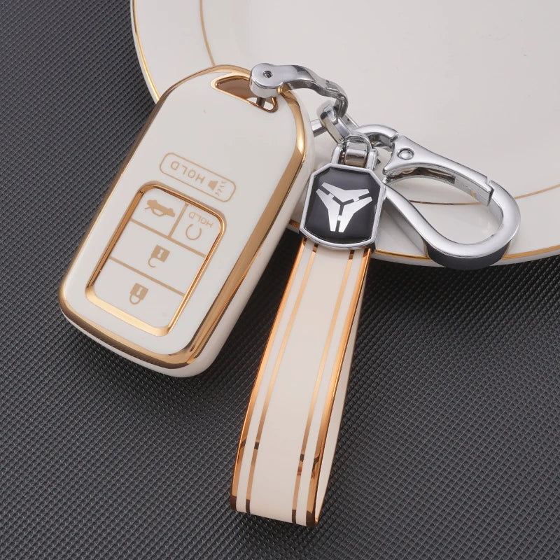 Étui pour clé de voiture en TPU blanc avec clip argenté et sangle en cuir, présentant plusieurs trousses.