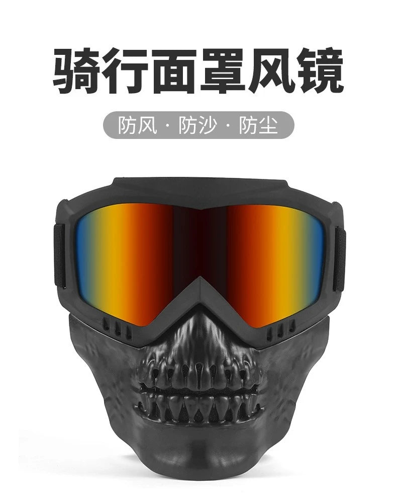 A black protective mask goggles with a skull design and mirrored lenses for outdoor sports.