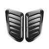 A pair of black decorative air intake vents for a car hood.