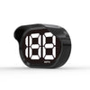 Compteur numérique noir avec l'indication MPH visible à l'avant.
