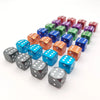 A collection of colorful aluminum dice valve caps arranged in a diagonal line.