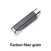 Grip de frein à main en fibre de carbone avec finition métallique polie.