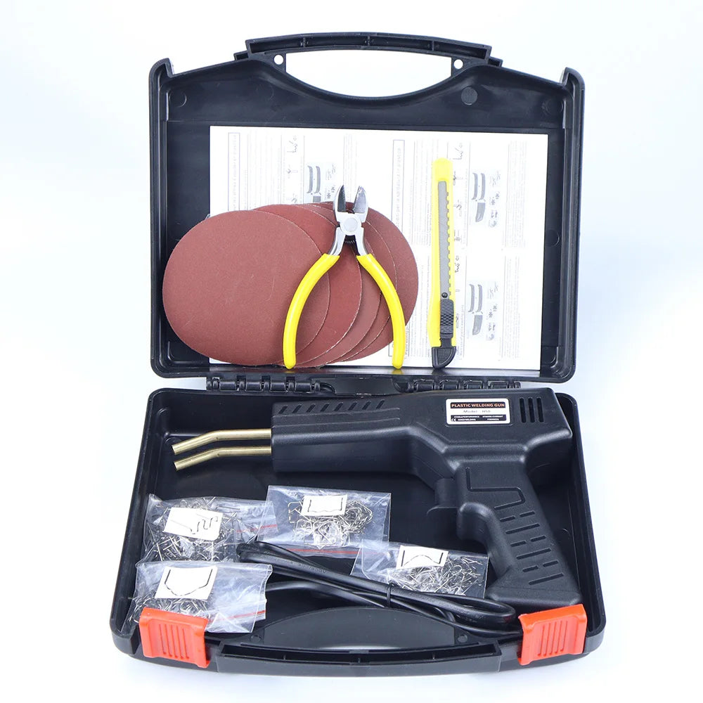 A black plastic welder kit with hot staples for repairs is shown in an open case.