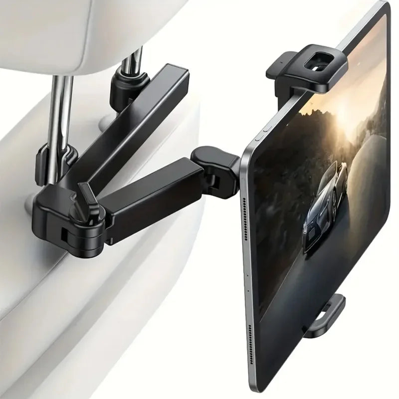 A black universal rotating mount attaches to a white car headrest, holding a tablet or phone.