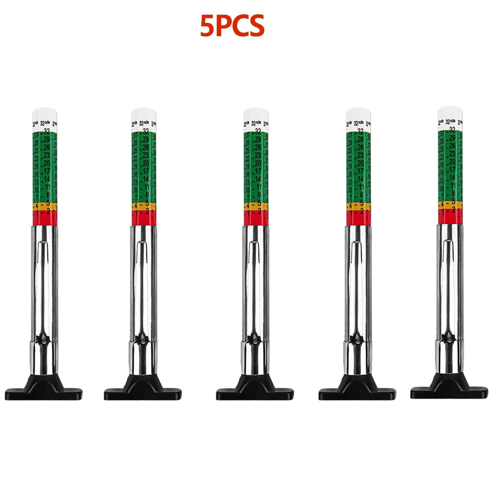 Five precision tire tread depth gauges with black bases and green measurement scales.