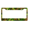 A rectangular license plate cover featuring a camouflage pattern of green, brown, and olive colors.