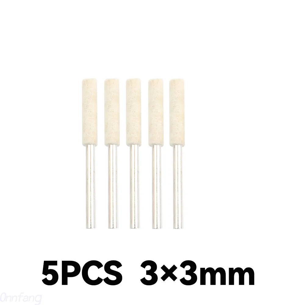 Five pieces of beige wool felt polishing buffing wheels measuring 3x3mm