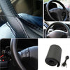Black faux leather steering wheel cover with a sewing kit and a rolled-up black cord.