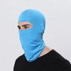 A person wearing a bright blue all-weather windproof balaclava face mask.