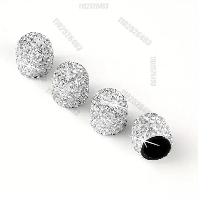 A set of clear crystal diamond finish tire valve caps.