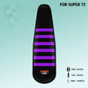 Black ribbed gripper seat cover for Super 73 with purple stripes.