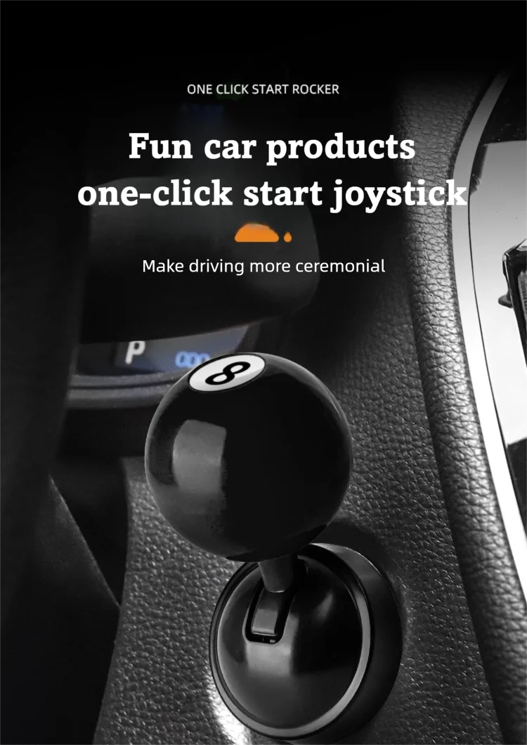 A close-up of a black joystick or button cover with the number 8, designed for a car start.