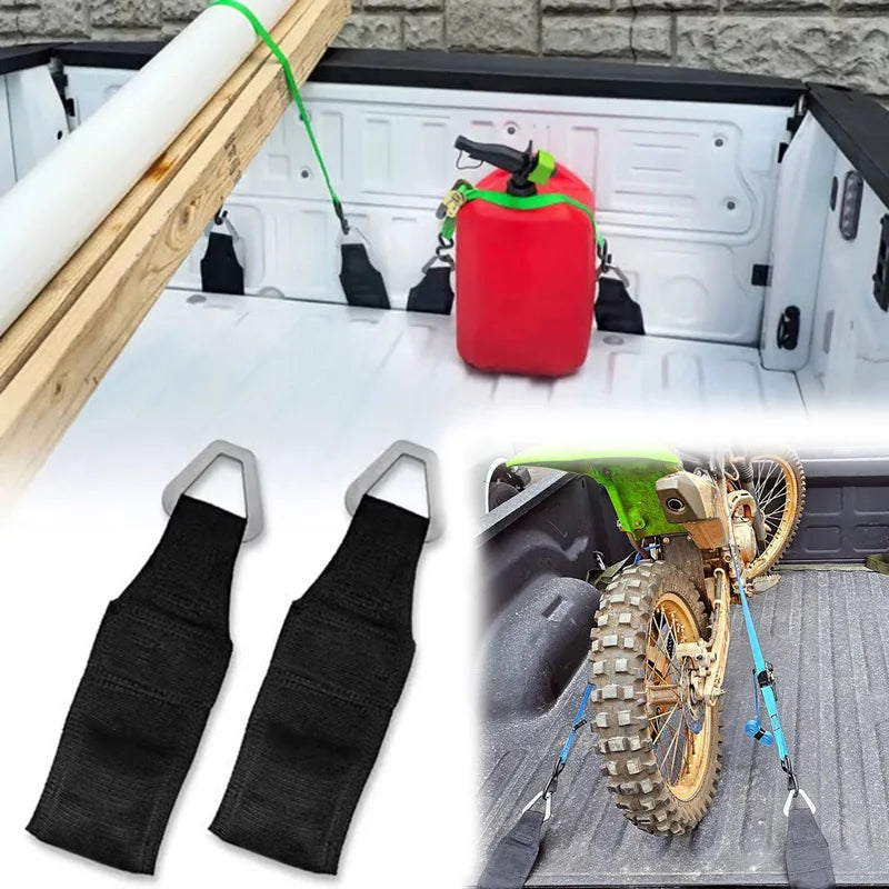 Black heavy-duty bed anchor straps and a red cargo container used for securing truck tailgates