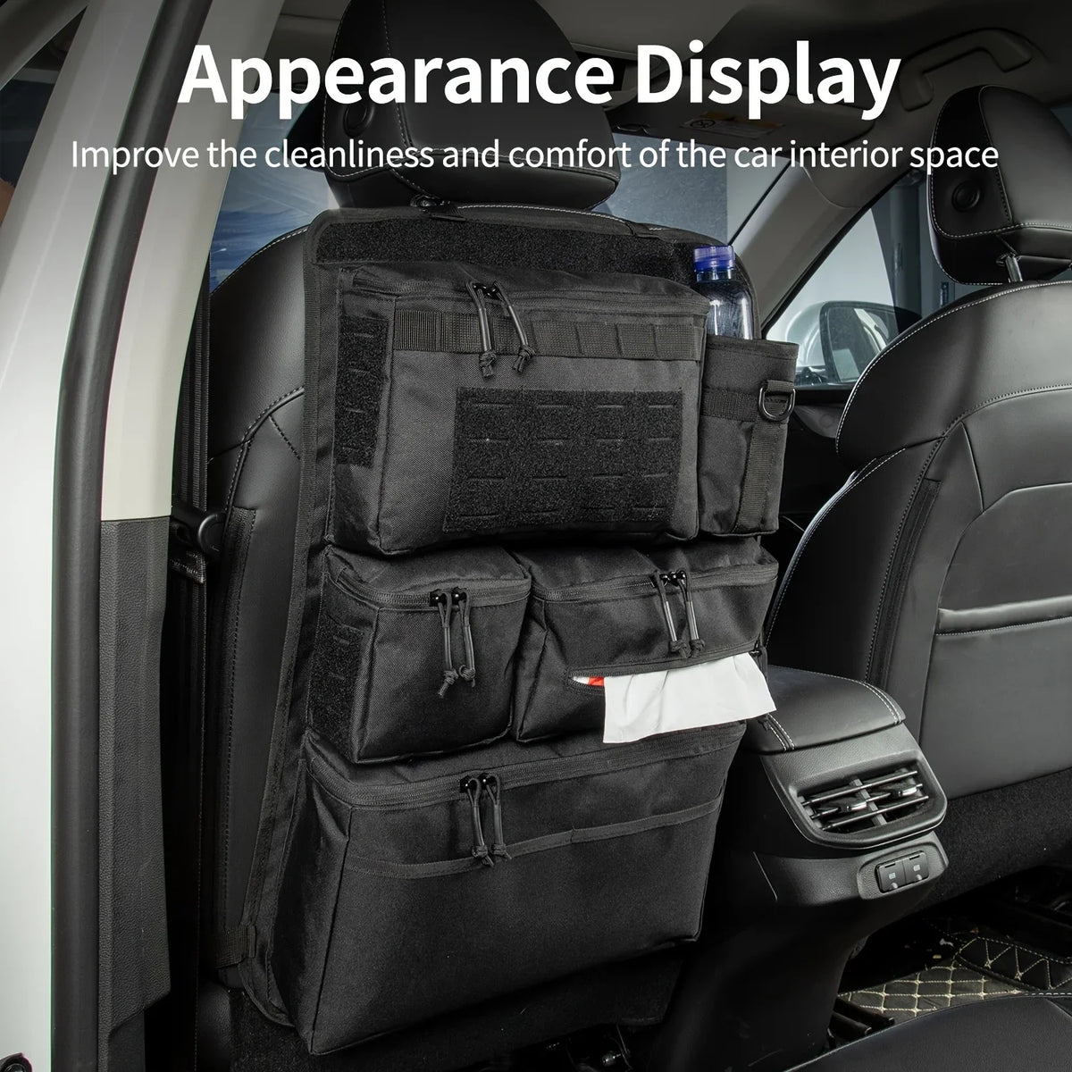 Black tactical luggage organizer bag displayed in a car interior, designed to improve cleanliness and comfort.