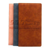 A set of three premium leather document and ID holders in shades of pink, blue-gray, and brown.