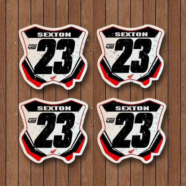 A set of four black and white racing number plate decals featuring the number 23 in red and gray on a distressed background.