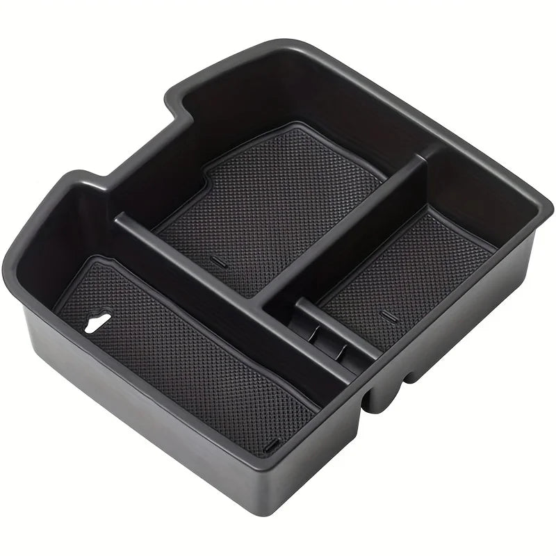 Black convertible armrest storage tray with multiple compartments for truck use