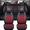 Black and red premium PU leather car seat covers shown in a vehicle interior.