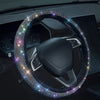 A close-up of a steering wheel covered in sparkling rhinestones and LED lights.