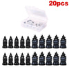 A set of 20 black tire repair nails and a screwdriver in a clear plastic box.