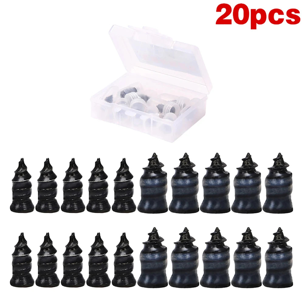 A set of 20 black tire repair nails and a screwdriver in a clear plastic box.