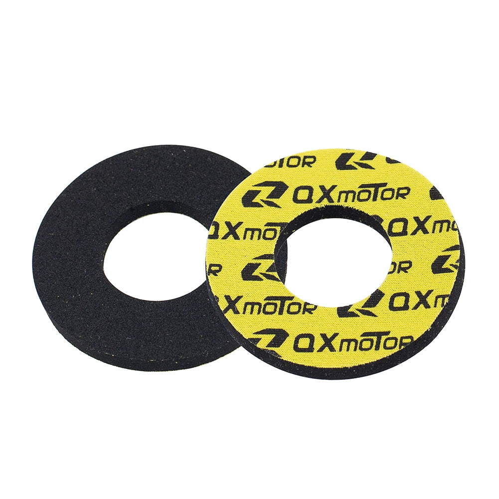 Two black and yellow gel rubber handlebar grips are shown, one solid black and the other yellow with black text.