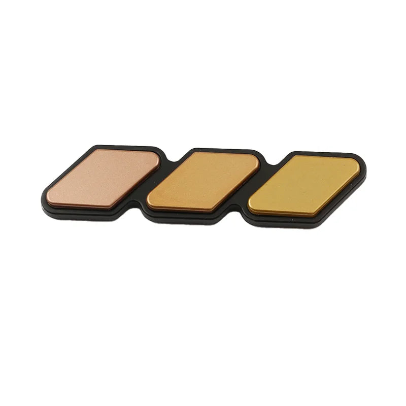 Three rectangular 3D car grill decals in copper, gold, and bronze colors.