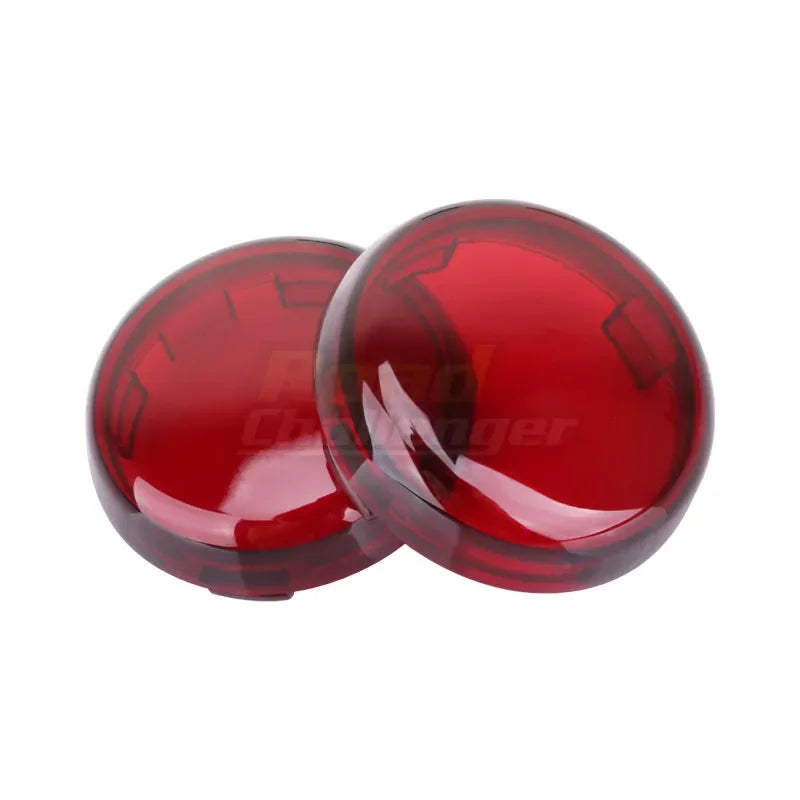 Ein Paar rote LED-Standsignal-Linsenabdeckungen für eine Harley-Motorrad.