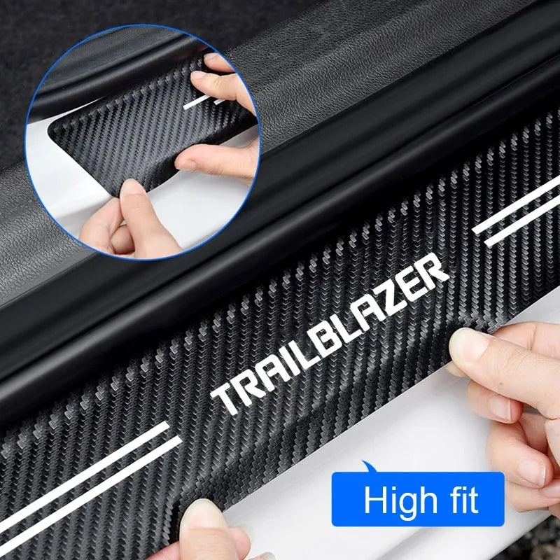 Close-up of a black carbon fiber decal protecting a car door or trunk, showing its texture and high fit.