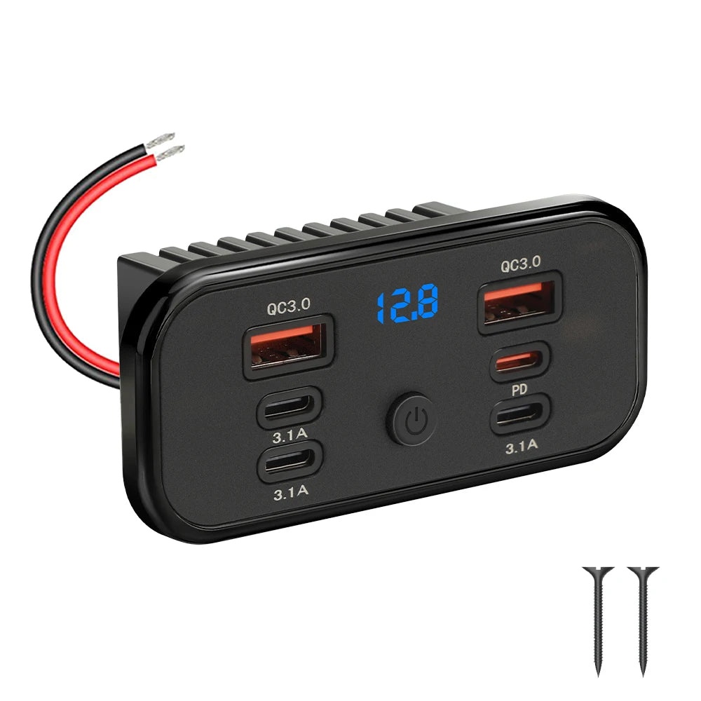 Black charger panel with a digital display showing 12.8 volts and multiple output ports for vehicle charging.