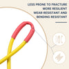 A close-up of a yellow and pink heat shrink tubing kit demonstrating its resilience for electrical insulation.