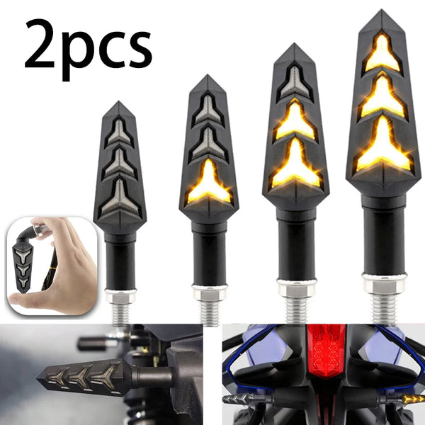 Two black motorcycle turn signal lights with LED bulbs shown in various angles and mounted on a handlebar.