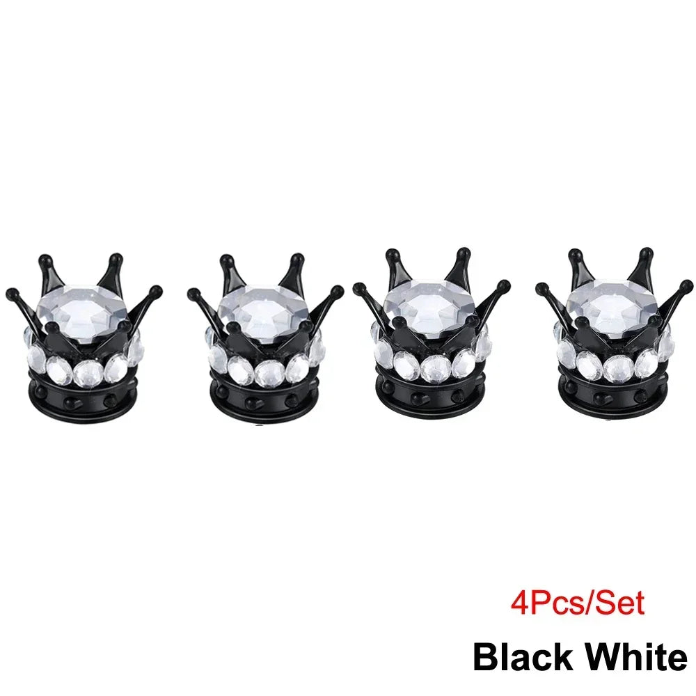 A set of four black and white diamond rhinestone tire valve caps.