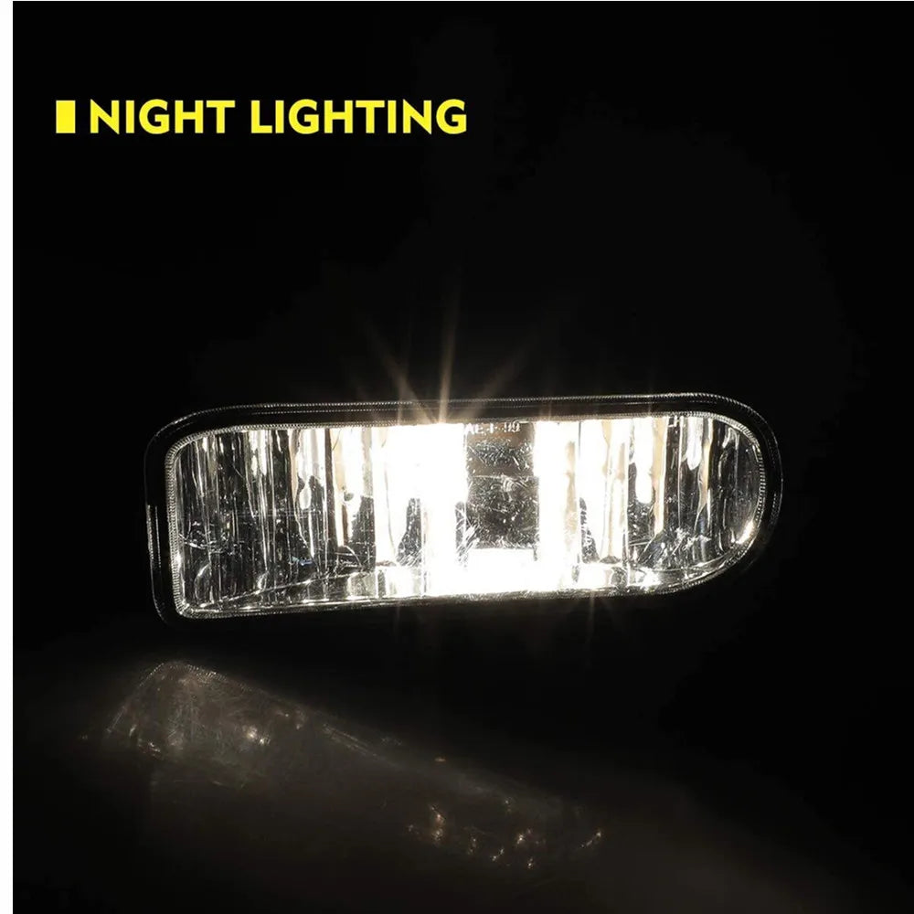 A clear lens fog light assembly is shown emitting a bright beam against a dark background.
