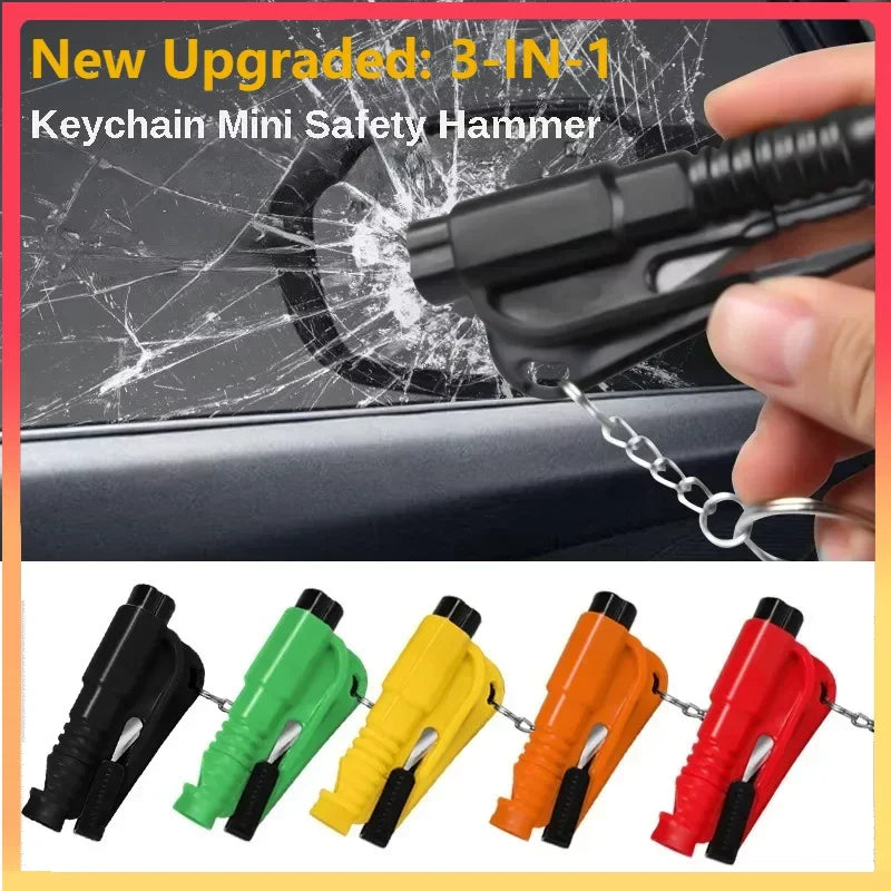 A hand holds a black keychain mini safety hammer and five colored versions of the 3-in-1 car emergency safety tool kit.