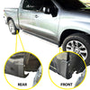 Close-up view of black mud flaps for the rear and front of a Chevrolet Silverado 1500 truck.