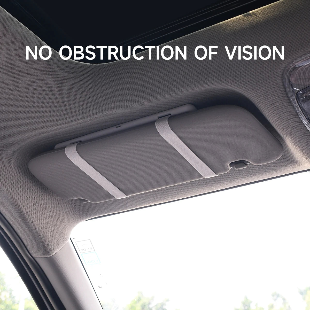 A car makeup mirror is installed on the interior panel, ensuring no obstruction of vision.
