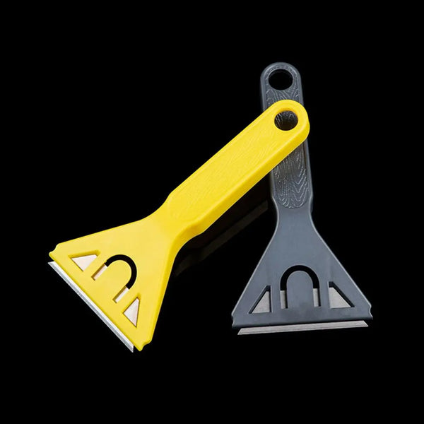 A yellow and gray versatile razor scraper tool used for cleaning glass, tile, and various surfaces.
