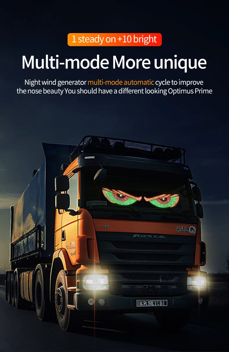 An orange truck is illuminated with an RGB dynamic demon eye light display on its front grille.