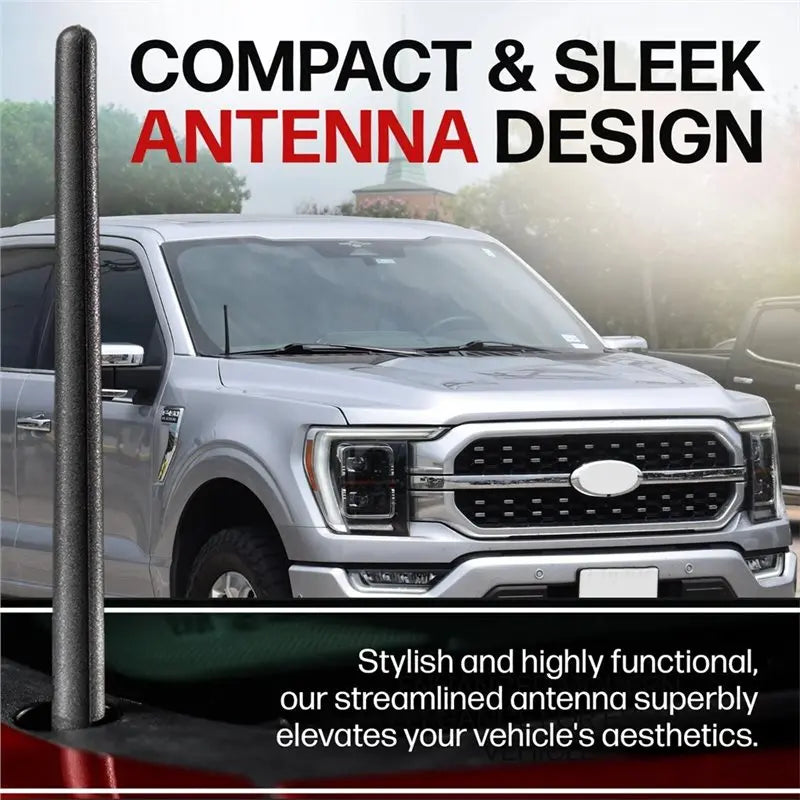 A close-up of a sleek antenna design installed on a silver Ford F-150 truck.