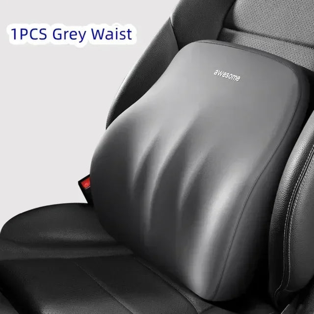 A grey waist cushion is shown placed on a car seat headrest for neck and shoulder support.