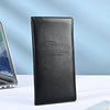 A black premium PU leather vehicle organizer wallet with embossed text for registration and insurance documents.