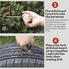 A hand inserts a fork drill and rubber strips into a tire borehole for repair.